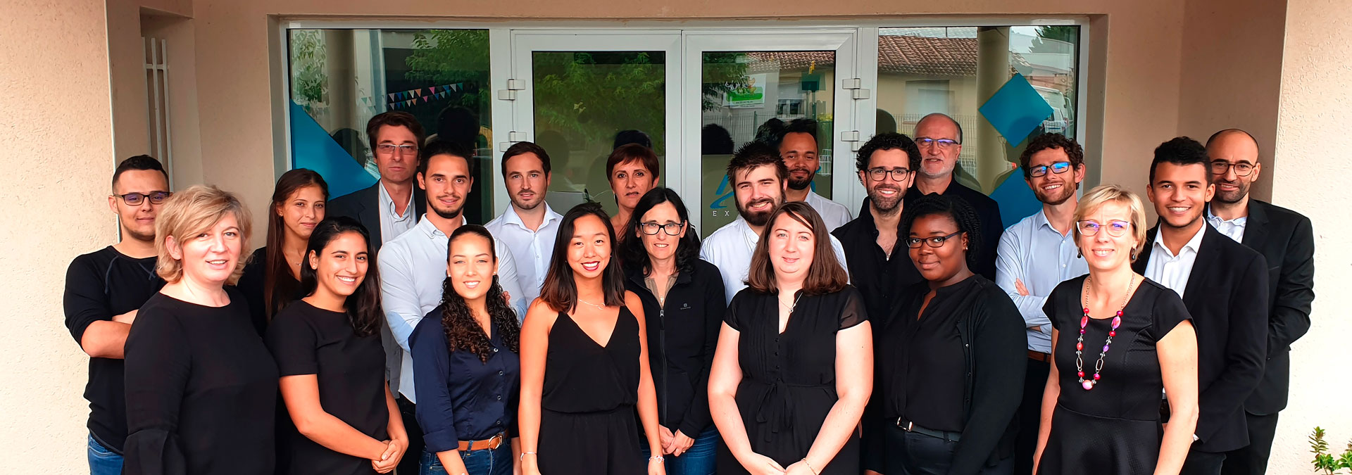 Photo de groupe de l'équipe d'Aura Expertise en 2018